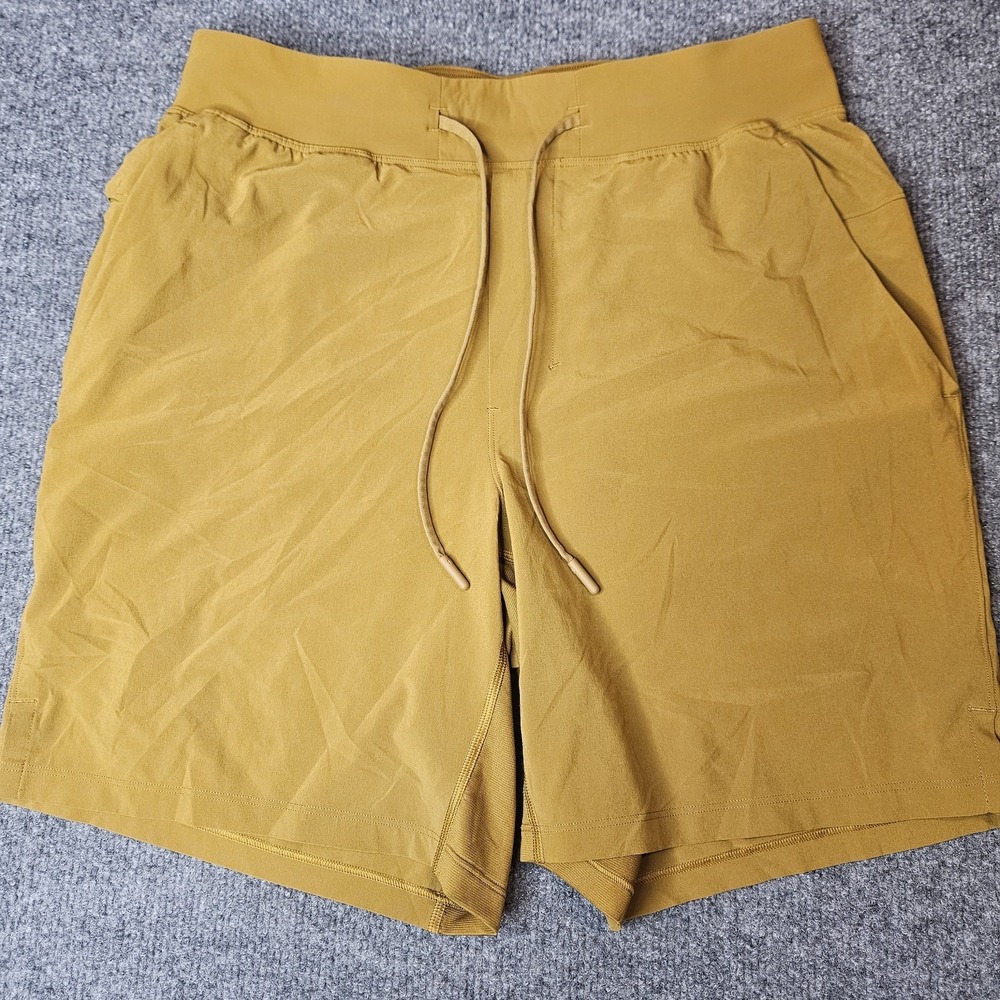 Lululemon Mens T.H.E. Shorts Size Medium Gold Spice 7" Inseam Gym Workout